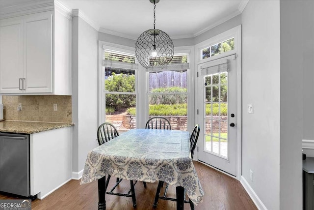 3400 Dencrest Ct SE, Smyrna, GA 30080 - dining room with baseboards, dark wood finished floors, and crown molding