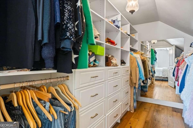2291 Mission Oak Ter, Grayson, GA 30017 - walk in closet featuring light wood finished floors and lofted ceiling