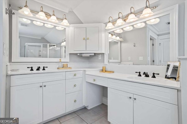 2291 Mission Oak Ter, Grayson, GA 30017 - bathroom featuring vaulted ceiling, a stall shower, vanity, and tile patterned floors