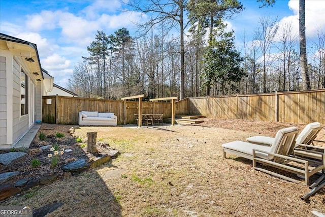 2291 Mission Oak Ter, Grayson, GA 30017 - fenced backyard with outdoor lounge area and a patio area