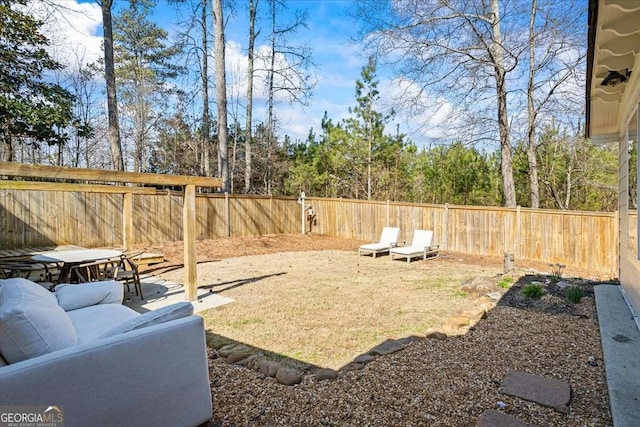 2291 Mission Oak Ter, Grayson, GA 30017 - fenced backyard featuring an outdoor living space