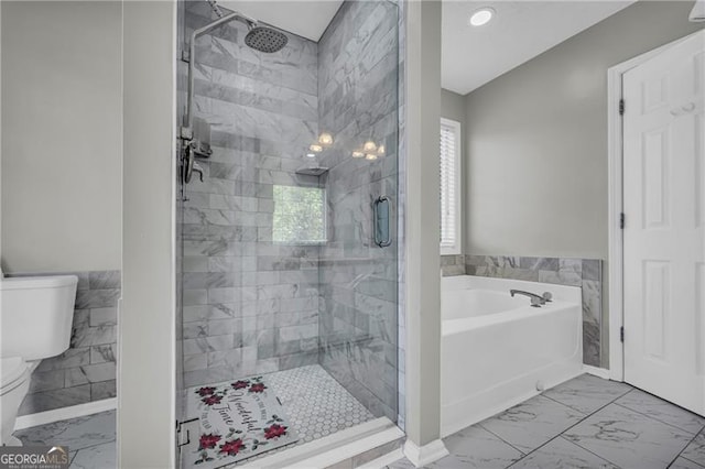 107 Timothy Ln, Bethlehem, GA 30620 - full bath featuring marble look tile flooring, a bath, a stall shower, and recessed lighting