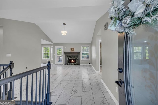 107 Timothy Ln, Bethlehem, GA 30620 - hallway with light marble finish floors, vaulted ceiling, and an upstairs landing