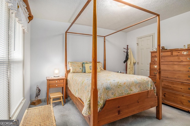 844 Potomac Pl, Winder, GA 30680 - bedroom featuring carpet flooring and a textured ceiling