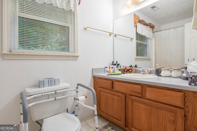 844 Potomac Pl, Winder, GA 30680 - full bath featuring toilet, vanity, and tile patterned flooring