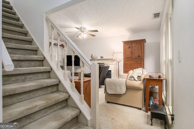 844 Potomac Pl, Winder, GA 30680 - staircase with ceiling fan and carpet