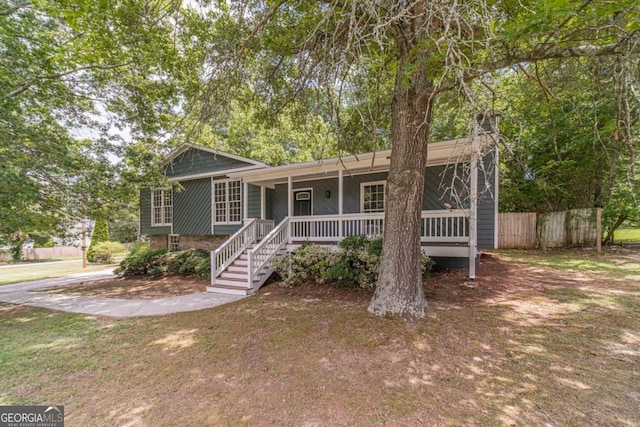 3404 Broxton Mill Way, Snellville, GA 30039 - view of front of house featuring covered porch and stairway
