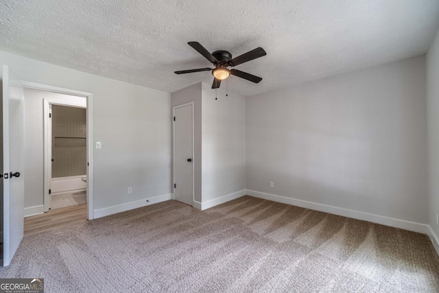 3404 Broxton Mill Way, Snellville, GA 30039 - spare room featuring a ceiling fan, carpet flooring, and a textured ceiling