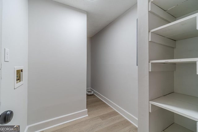 3404 Broxton Mill Way, Snellville, GA 30039 - laundry area featuring washer hookup and light wood finished floors