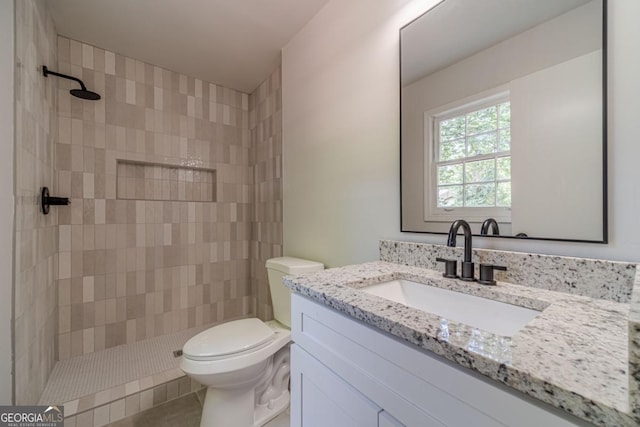 3404 Broxton Mill Way, Snellville, GA 30039 - bathroom with vanity, tiled shower, and tile patterned flooring