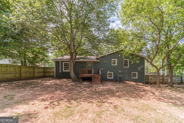 3404 Broxton Mill Way, Snellville, GA 30039 - rear view of property featuring a fenced backyard and a wooden deck