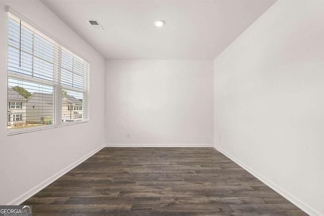 620 Lobelia Way, Locust Grove, GA 30248 - unfurnished room featuring dark wood finished floors and recessed lighting