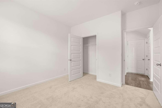 620 Lobelia Way, Locust Grove, GA 30248 - unfurnished bedroom featuring carpet flooring and a closet