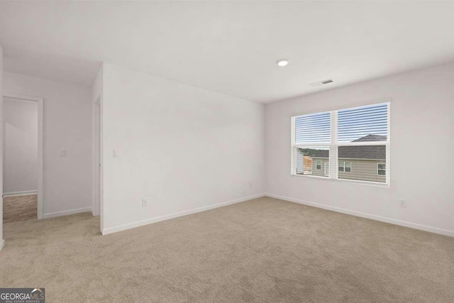 620 Lobelia Way, Locust Grove, GA 30248 - empty room with carpet floors and baseboards