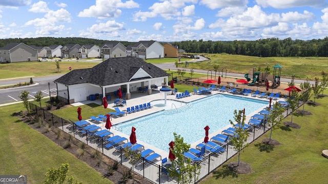 620 Lobelia Way, Locust Grove, GA 30248 - community pool featuring a patio
