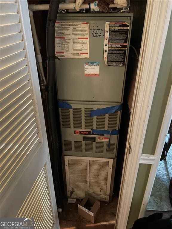 60 King Blvd, Mcdonough, GA 30253 - utility room featuring heating unit