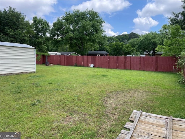 60 King Blvd, Mcdonough, GA 30253 - fenced backyard featuring a storage unit