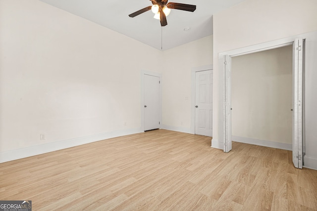 6802 Ida St, Lithonia, GA 30058 - unfurnished bedroom featuring light wood-style flooring, multiple closets, and ceiling fan