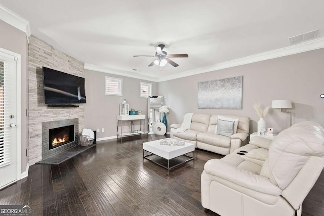 2939 Woodward Down Trl, Buford, GA 30519 - living area with a ceiling fan, ornamental molding, a stone fireplace, hardwood / wood-style floors, and baseboards