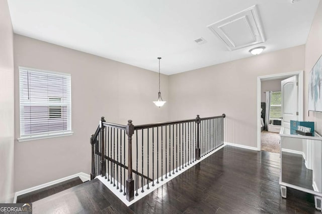 2939 Woodward Down Trl, Buford, GA 30519 - corridor featuring attic access, baseboards, wood finished floors, and an upstairs landing