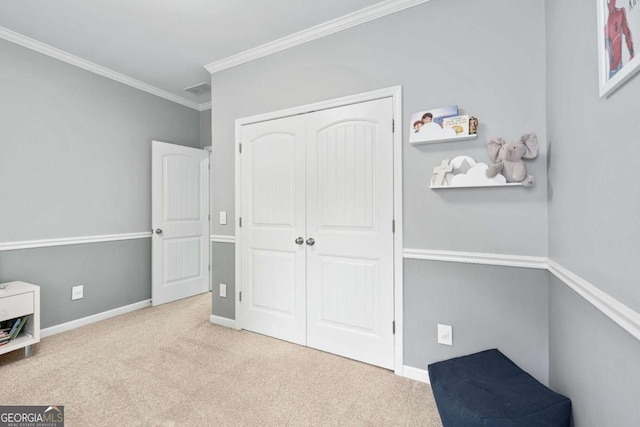 2939 Woodward Down Trl, Buford, GA 30519 - unfurnished bedroom featuring carpet, crown molding, a closet, and baseboards