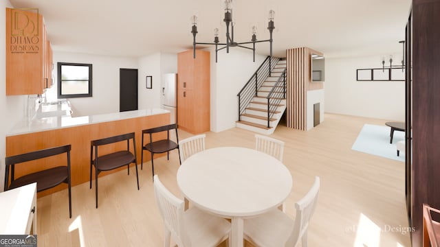 458 Shannon Dr SW, Atlanta, GA 30310 - dining space with a chandelier, light wood-style flooring, and stairs