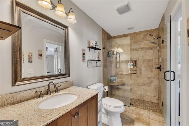 3271 Sutcliffe Rdg, Marietta, GA 30064 - bathroom featuring toilet, a stall shower, and vanity
