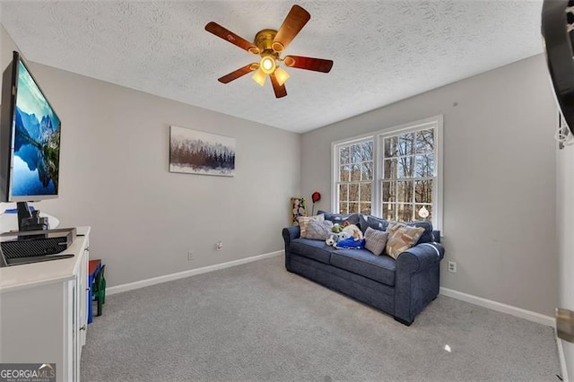 3271 Sutcliffe Rdg, Marietta, GA 30064 - living area featuring a textured ceiling, a ceiling fan, carpet flooring, baseboards, and an office area