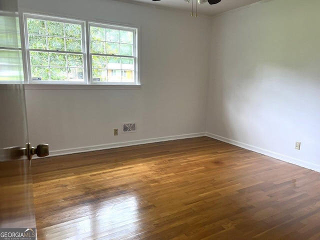988 Hickory Ridge Dr, Macon, GA 31204 - spare room featuring ceiling fan, wood finished floors, crown molding, and baseboards