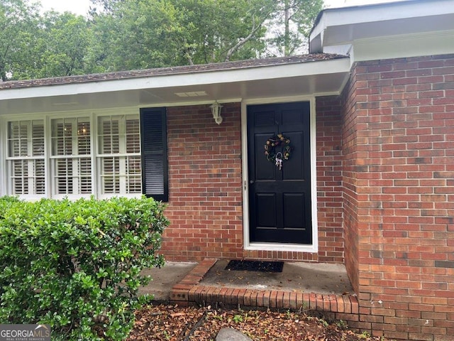 988 Hickory Ridge Dr, Macon, GA 31204 - entrance to property featuring brick siding and a porch