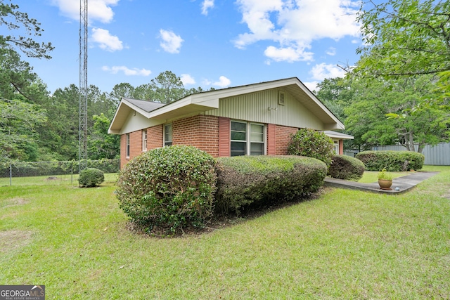114 Pippin Rd, Hillsboro, GA 31038 - view of side of home with brick siding