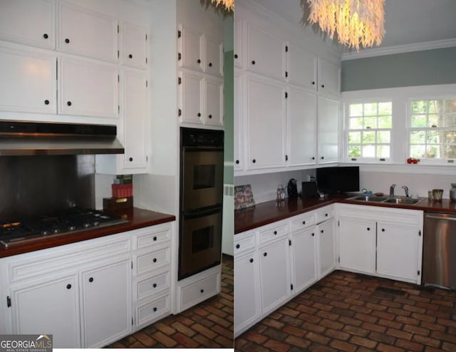 1201 Rawson Dr, Albany, GA 31701 - kitchen with dishwasher, under cabinet range hood, multiple ovens, dark countertops, and a sink