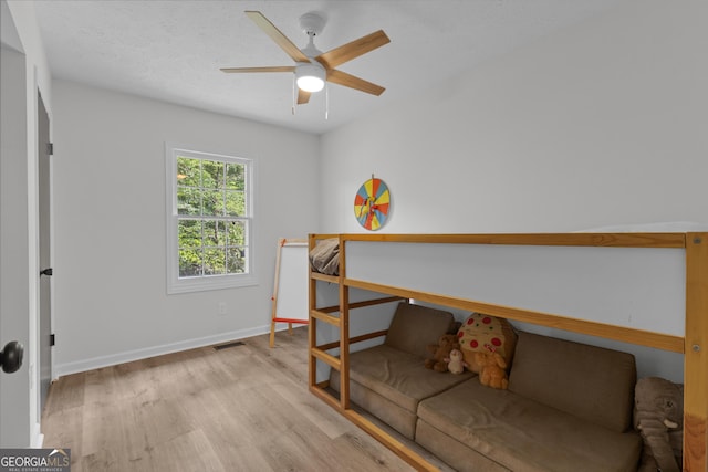 6290 Cascade Palmetto Hwy, Fairburn, GA 30213 - bedroom featuring wood finished floors, baseboards, and a ceiling fan