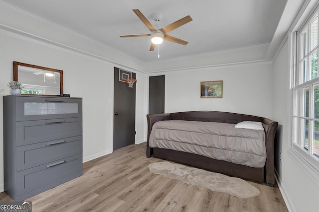 6290 Cascade Palmetto Hwy, Fairburn, GA 30213 - bedroom featuring light wood-type flooring, multiple windows, baseboards, crown molding, and ceiling fan