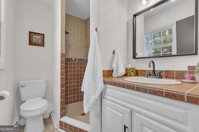 6290 Cascade Palmetto Hwy, Fairburn, GA 30213 - full bathroom with tiled shower, toilet, and vanity