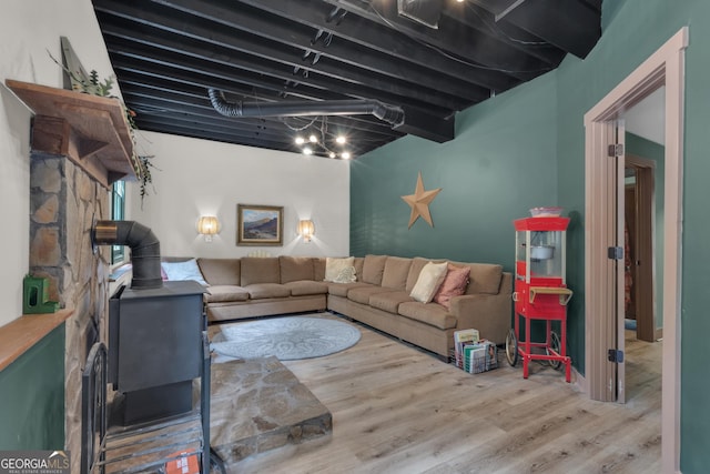 6290 Cascade Palmetto Hwy, Fairburn, GA 30213 - living area featuring wood finished floors and a wood stove