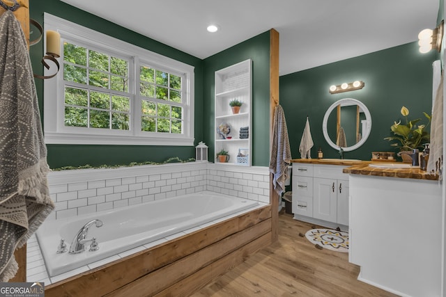 6290 Cascade Palmetto Hwy, Fairburn, GA 30213 - full bathroom with vanity, wood finished floors, and a bath