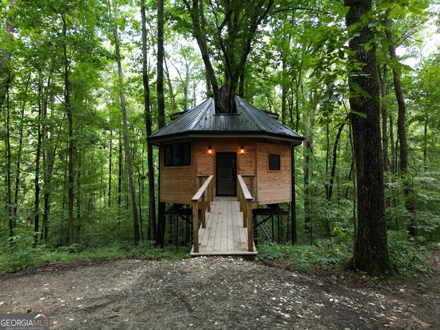 6290 Cascade Palmetto Hwy, Fairburn, GA 30213 - view of outdoor structure with a forest view