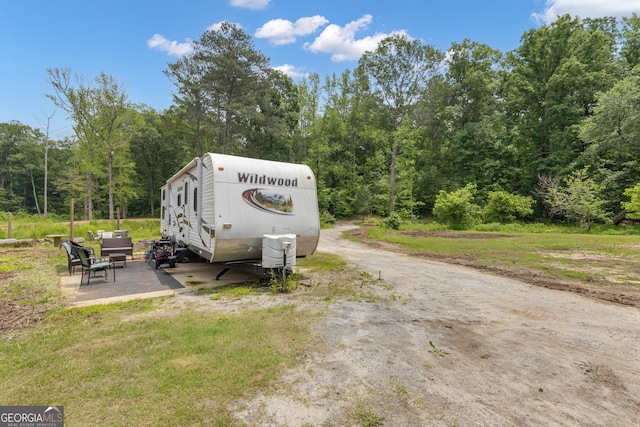 6290 Cascade Palmetto Hwy, Fairburn, GA 30213 - view of dirt / gravel road featuring a wooded view