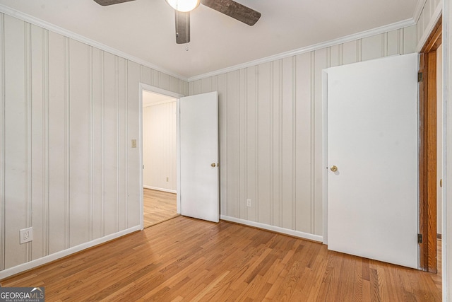 3431 Alcan Way, Tucker, GA 30084 - unfurnished bedroom featuring light wood-type flooring, crown molding, baseboards, and ceiling fan