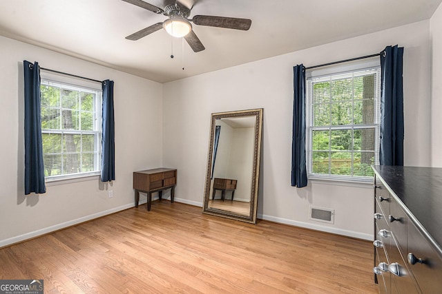3431 Alcan Way, Tucker, GA 30084 - spare room with light wood-type flooring, baseboards, and ceiling fan