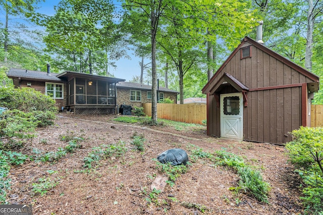 3431 Alcan Way, Tucker, GA 30084 - view of yard featuring a sunroom and an outbuilding