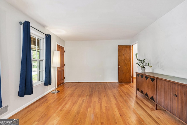 3431 Alcan Way, Tucker, GA 30084 - spare room featuring light wood-type flooring and baseboards