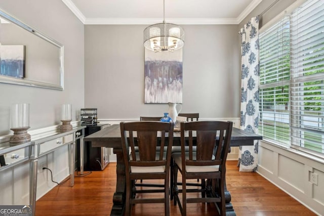 1858 Preserve Way, Atlanta, GA 30341 - dining area featuring a chandelier, plenty of natural light, wood finished floors, crown molding, and a decorative wall