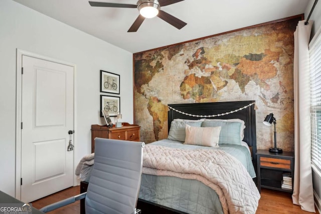 1858 Preserve Way, Atlanta, GA 30341 - bedroom with wood finished floors, an accent wall, and ceiling fan