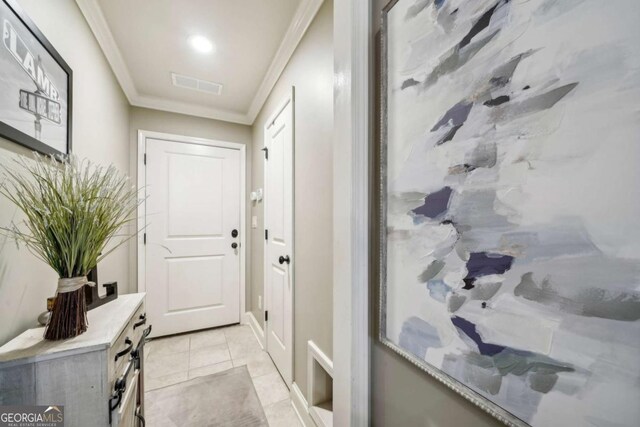1858 Preserve Way, Atlanta, GA 30341 - doorway to outside featuring ornamental molding and light tile patterned floors