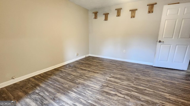4326 Ga Highway 109, Molena, GA 30258 - spare room featuring dark wood-style flooring and baseboards