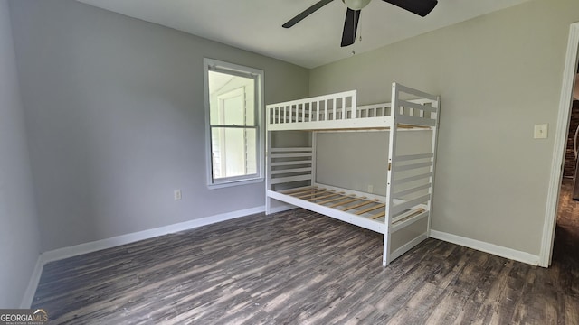 4326 Ga Highway 109, Molena, GA 30258 - unfurnished bedroom featuring wood finished floors, baseboards, and ceiling fan
