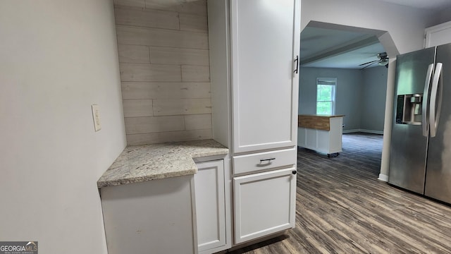 4326 Ga Highway 109, Molena, GA 30258 - kitchen featuring stainless steel fridge with ice dispenser, ceiling fan, white cabinetry, dark wood-style flooring, and light stone countertops