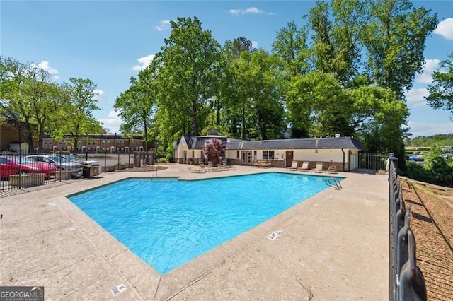 105 N River Dr Unit A, Atlanta, GA 30350 - community pool featuring a patio area